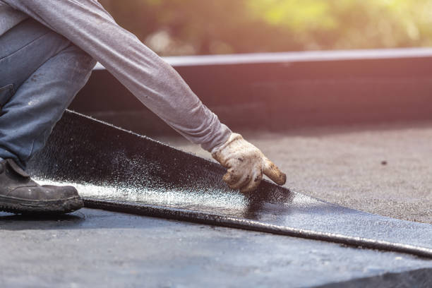 Professional Basement Waterproofing technician working in Oradell, NJ